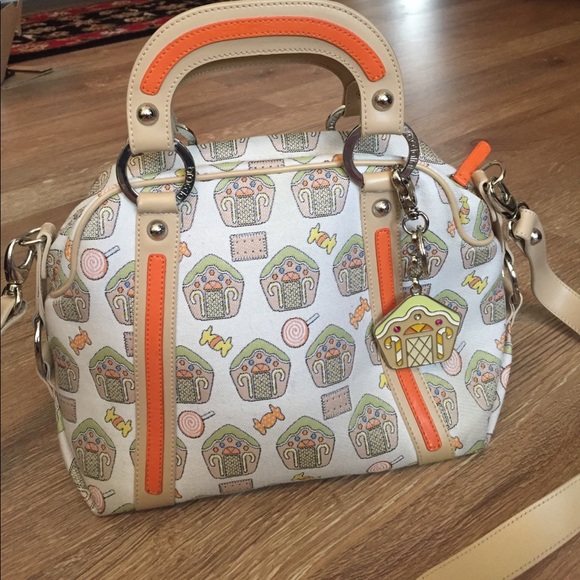 Braccialini Handbags - Braccialini gingerbread house bag with charm